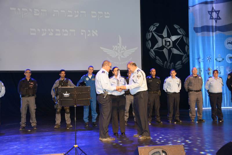 צמד המילים 'לשרת ולהגן' מתמצת את הרעיון כולו. טקס העברת תפקיד ראש אג ניצב אלון לבבי מונה לראש אגף המבצעים במשטרה